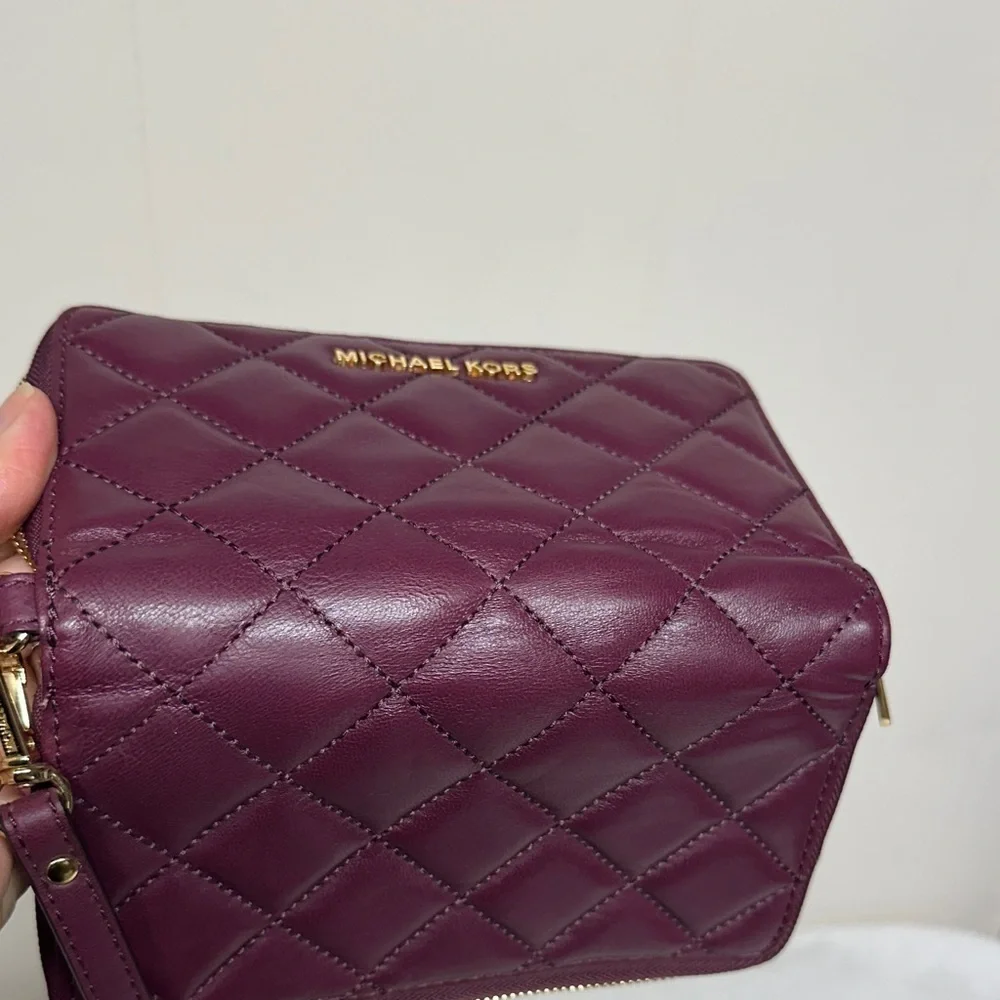 Michael Kors Plum Quilted Wristlet/ wallet